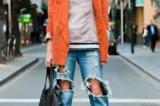With sweatshirt, distressed jeans and ankle boots