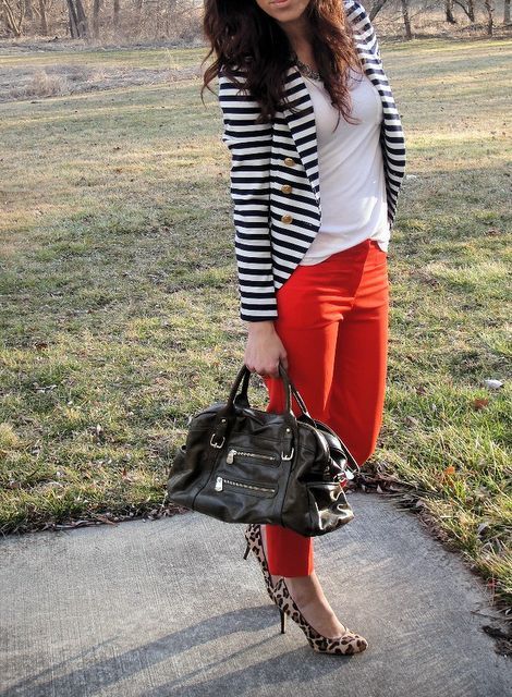 With white t-shirt, striped jacket, leopard pumps and black bag