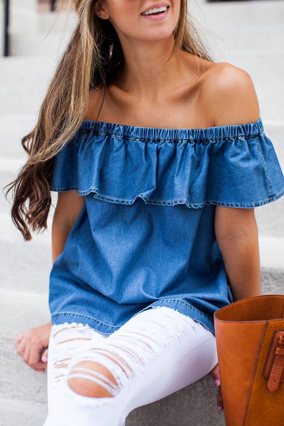 a denim off the shoulder and distressed jeans for a cool look