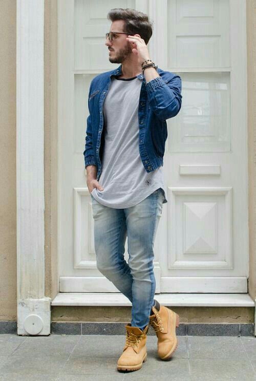 distressed jeans, a grey t-shirt, a blue denim jacket and yellow boots