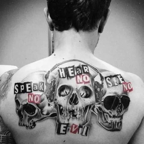 Bible inspired skull tattoo on the back