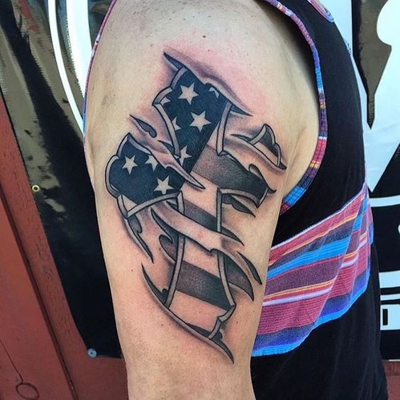 American flag in cross design on an arm