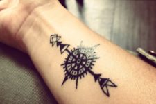 15 black ink compass arrow tattoo