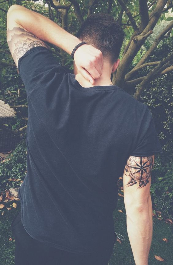 black ink windrose compass tattoo