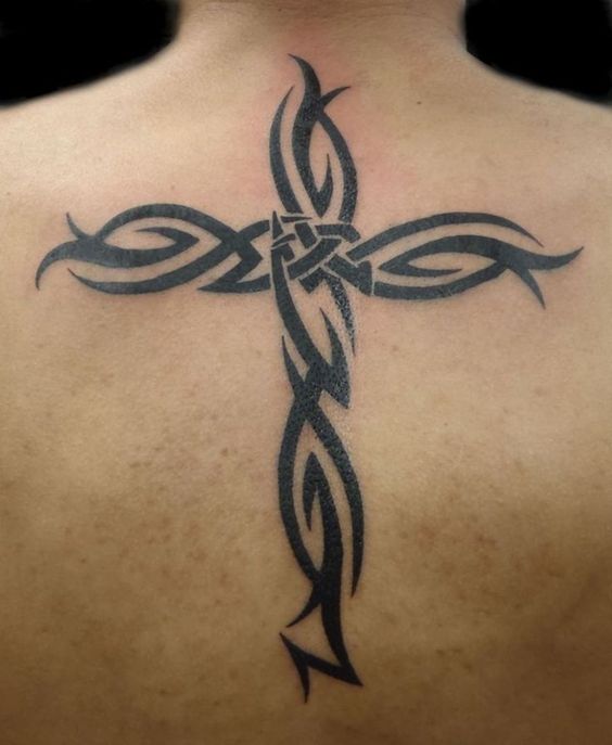 Celtic black ink back tattoo