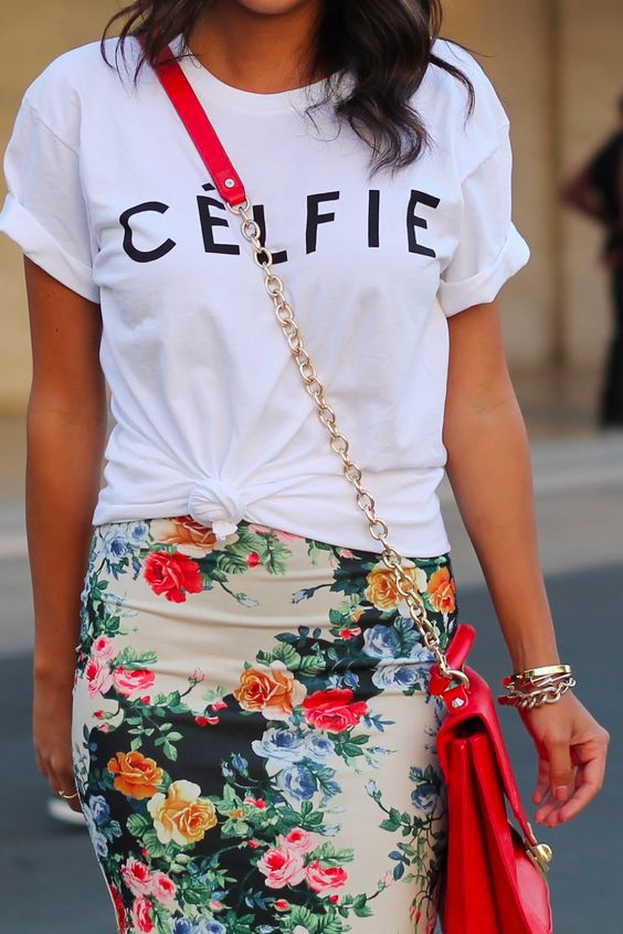 a printed tee, a bold floral pencil skirt and a red crossbody