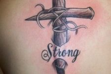 21 meaningful wooden cross tattoo inspired by the Bible