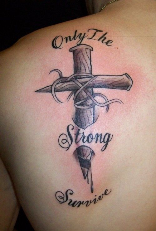 meaningful wooden cross tattoo inspired by the Bible