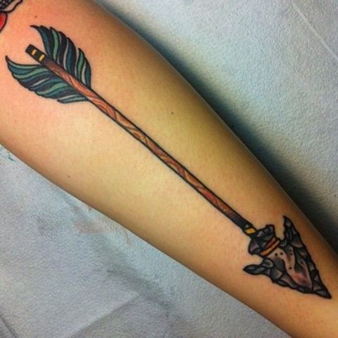 Arrow tattoo with green color