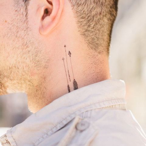Arrows tattoos on the neck