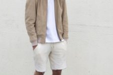 Beige jacket with white t-shirt and beige shorts