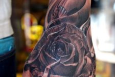 Floral tattoo on the left arm