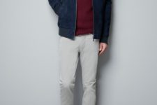 Navy blue jacket with marsala sweater and white pants