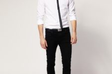 With black tie, white shirt and brown boots
