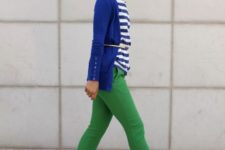With blue blazer, green skinny pants and printed shirt