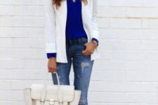 With blue shirt, white blazer, distressed jeans and white bag