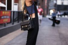 With crop top, black overall and black bag
