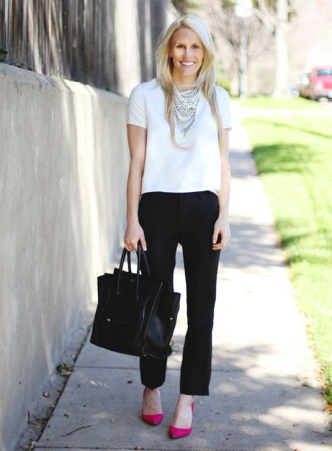With crop white shirt, black pants and leather bag