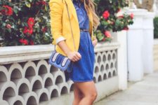 With denim dress, beige shoes and printed bag