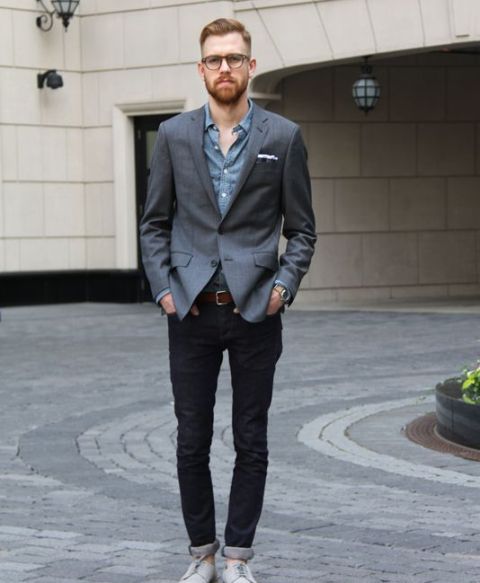 With denim shirt, gray jacket and neutral color shoes