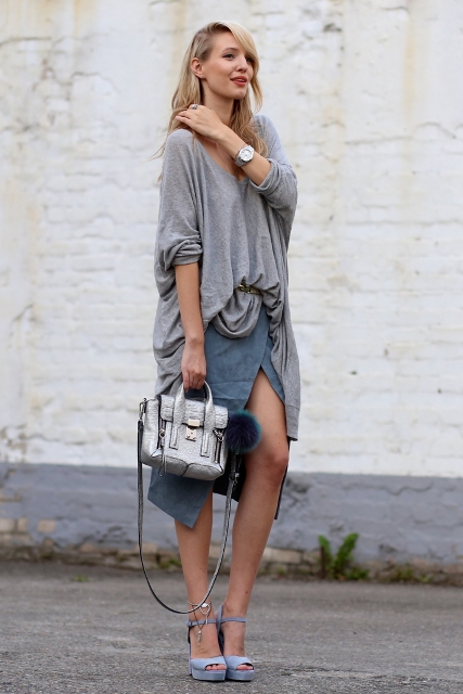 With gray loose blouse, wrap skirt and pastel color shoes
