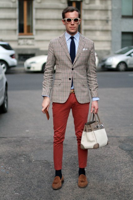 With light blue shirt, dark color tie, checked blazer and brown shoes