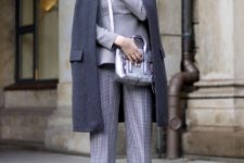 With printed suit, black pumps and coat