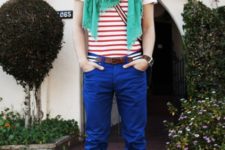 With red striped shirt, green scarf and sporty boots