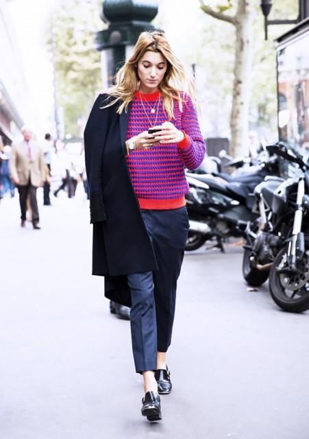 With striped sweater, navy blue trousers and coat