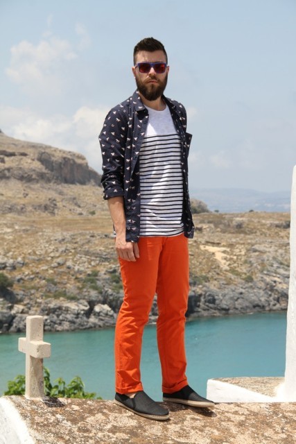 With striped t-shirt, printed button down shirt and black shoes