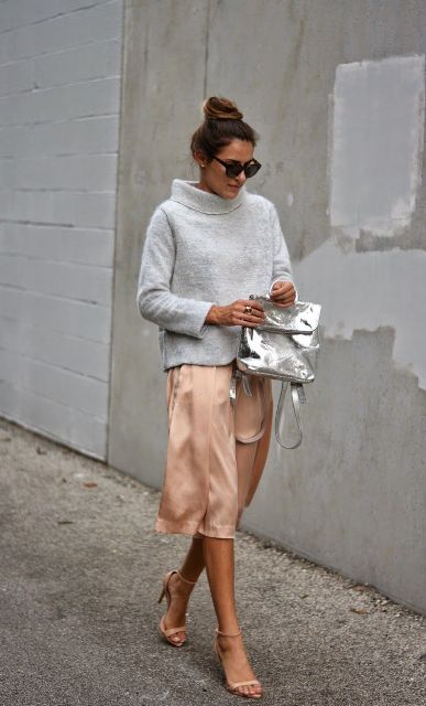 With turtleneck, silk skirt and neutral color sandals