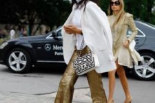 With white blouse, white long blazer and printed bag