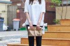 With white loose shirt, crop pants and white sneakers