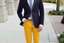 With white shirt, gray tie, navy blue blazer and white sneakers