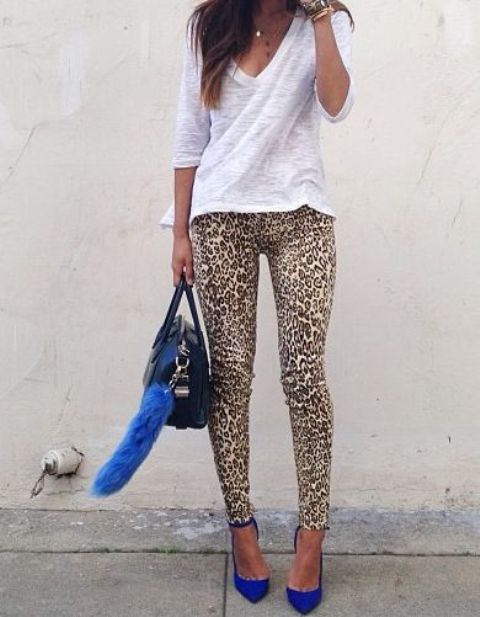 With white shirt, leopard leggings and black bag