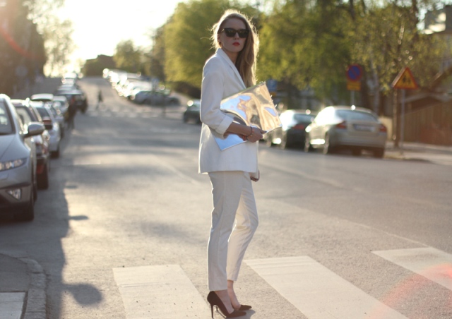 With white suit and marsala pumps