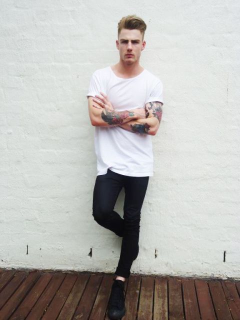 With white t-shirt and black shoes