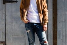 With white t-shirt, cuffed jeans and brown boots