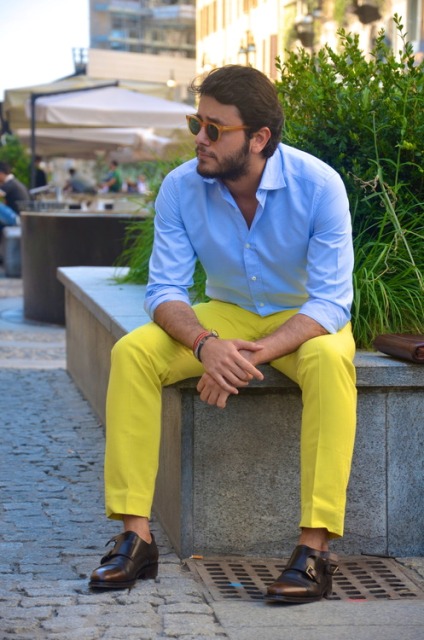 With yellow pants and light blue shirt