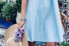 light blue ruffle off the shoulder dress, pompom sandals and a hat