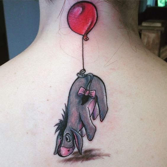 a colorful donkey tattoo with a balloon on the back and neck