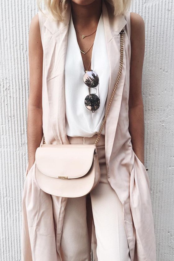 blush pants and a long vest, a white top with a V cut