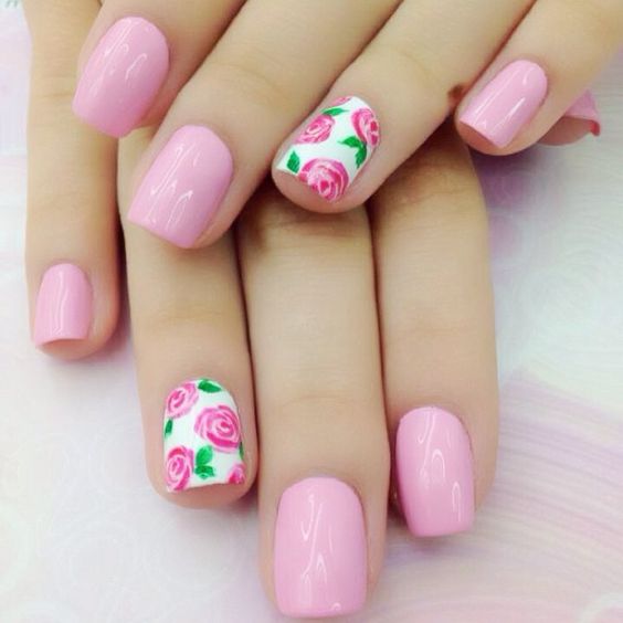 bold pink nails with accent pink roses