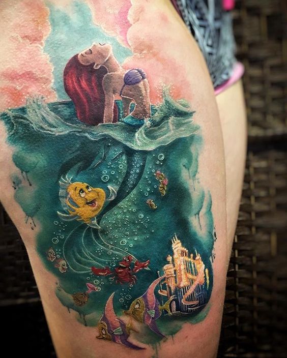 adorable Ariel and flounder leg tattoo
