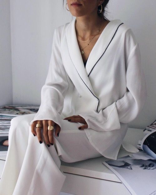 white silk pajamas with a black trim feels and looks awesome