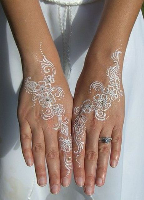 flower white henna tattoos on both hands