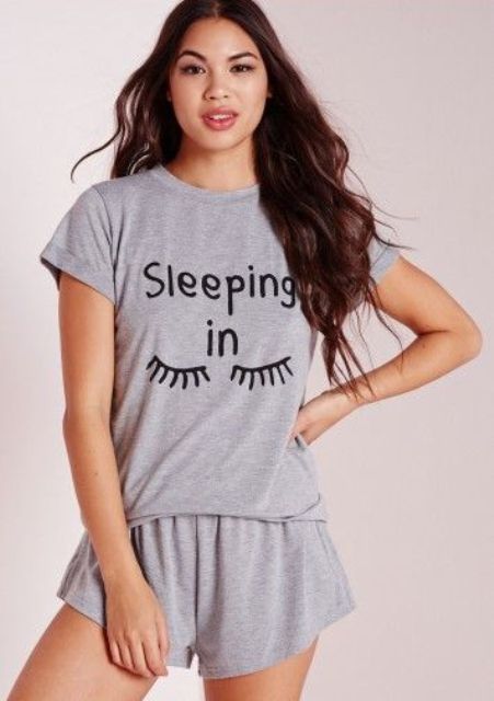 a grey printed pajams with shorts and a tee