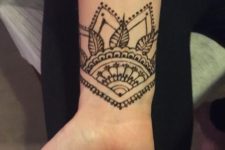 12 2temporary henna tattoo with a geometric feel and some botanicals