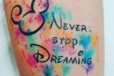 12 Mickey-inspired tattoo with watercolor touches