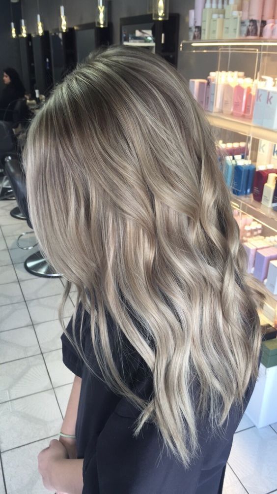 dimensional ashy blonde hair with waves